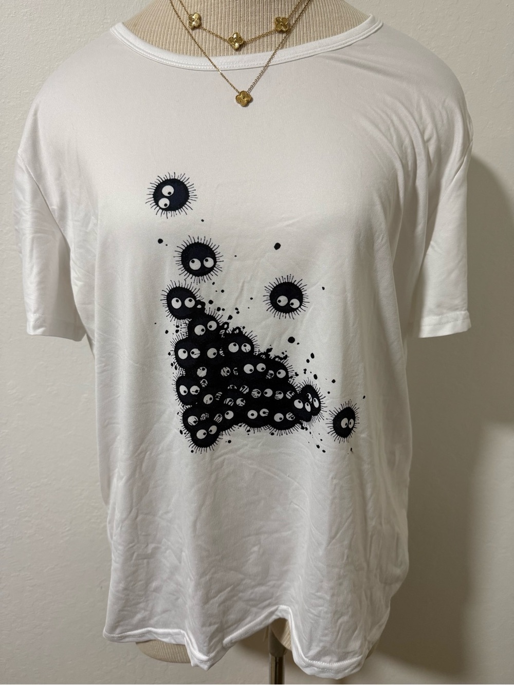 White Graphic Tee with Black Soot Sprite Design